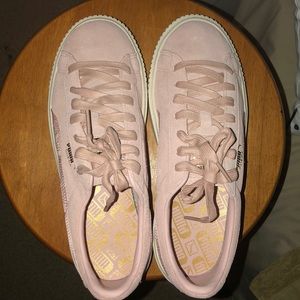 Light pink and white puma suede